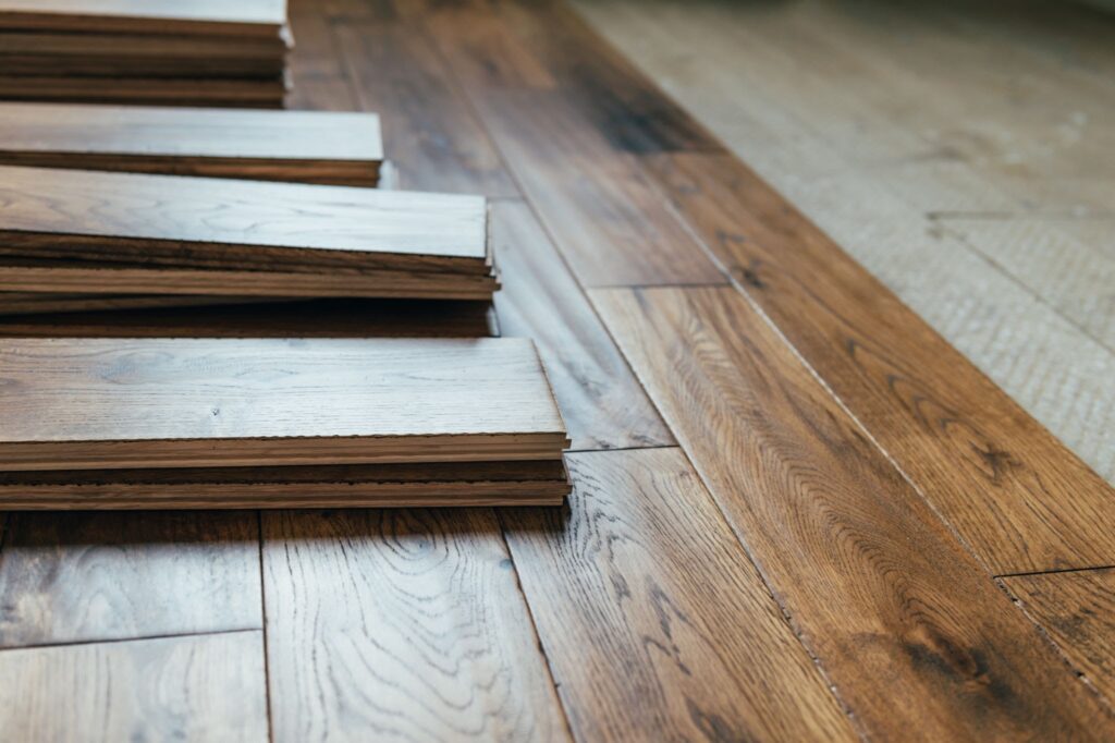 Pieces of hardwood flooring being laid out